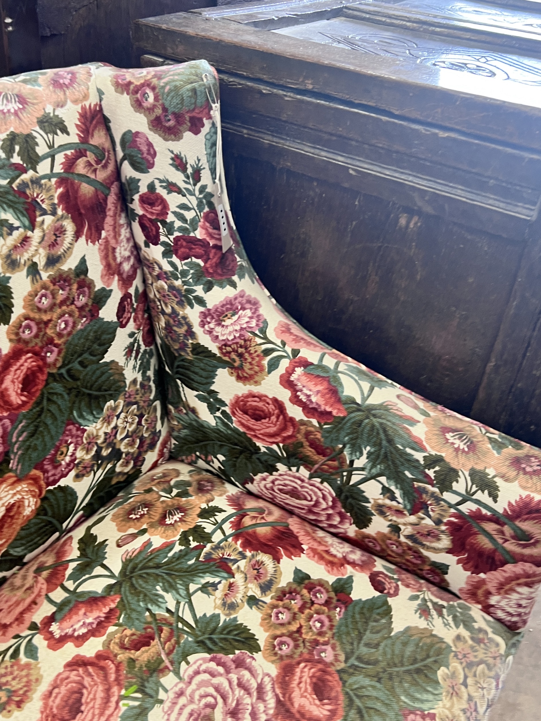 A small Victorian style floral fabric settee, length 128cm, depth 59cm, height 90cm